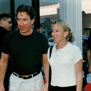 Laura Deibel and her ex-husband, Tim Allen hand in hand